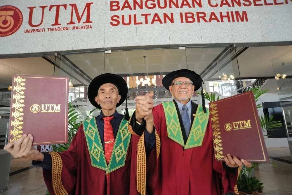 Abdul Hakim (kiri) dan Kamarul Azman. 