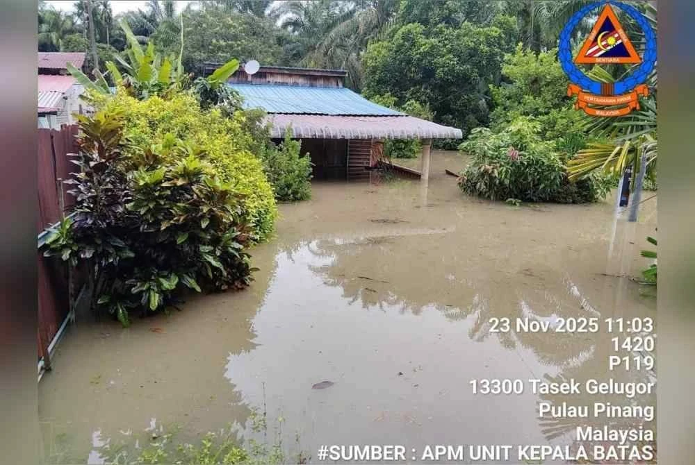 Beberapa kawasan di Tasek Gelugor mula dilanda banjir sejak petang Ahad. Foto APM