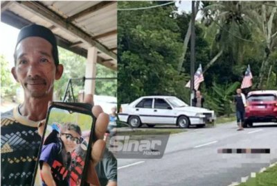 Adnan Saad, 49, menunjukkan gambar arwah anak bongsunya, Muhammad Izhar yang maut akibat dirempuh kereta ketika menunggang basikal di Kampung Sedaka Tengah pada Sabtu.