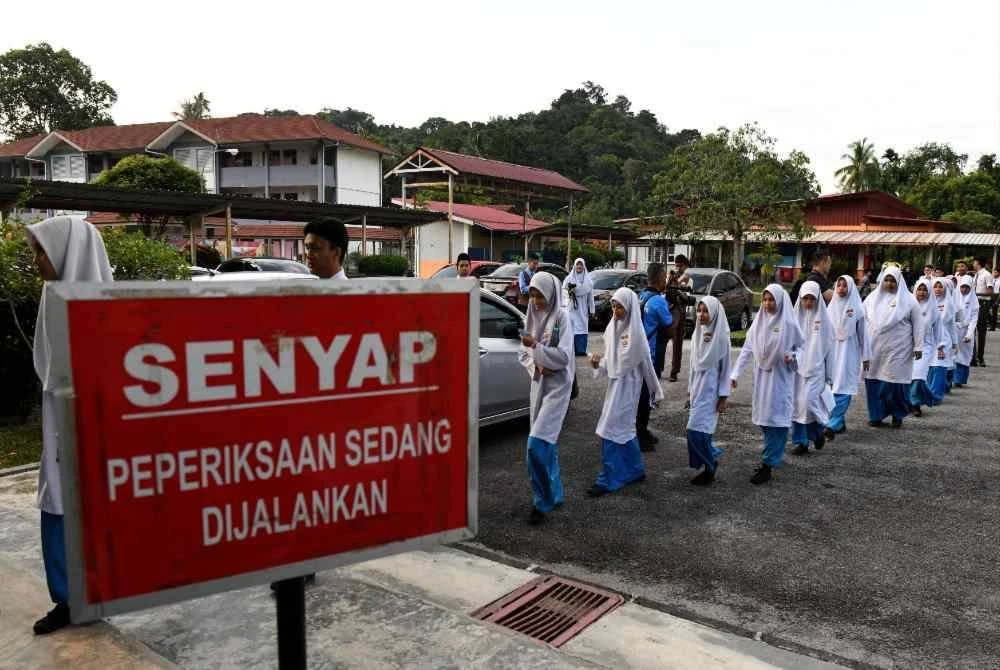JPNT mengaktifkan Ops Payung bermula pada 13 November lepas di semua daerah di negeri ini untuk memastikan calon SPM dapat menduduki peperiksaan itu dengan lancar, esok. Foto fail Bernama