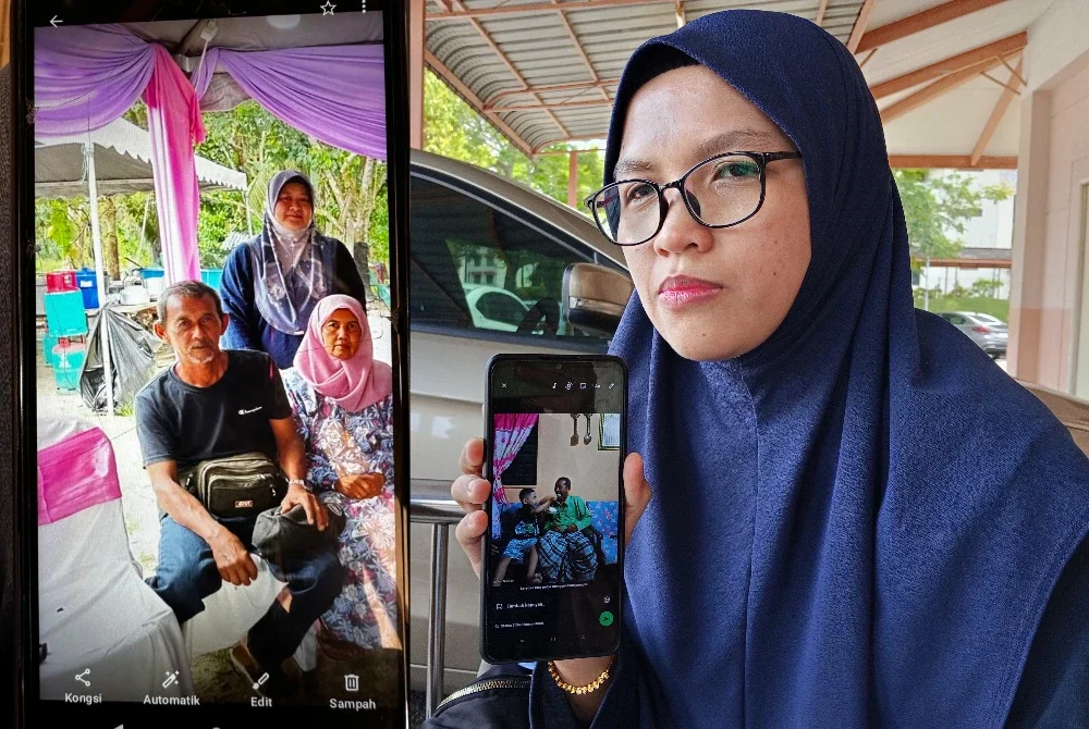 Noor Shahin menunjukkan gambar kenangan bersama Allahyarham ayahnya ketika ditemui di Unit Forensik Hospital Sultanah Nora Ismail Batu Pahat.