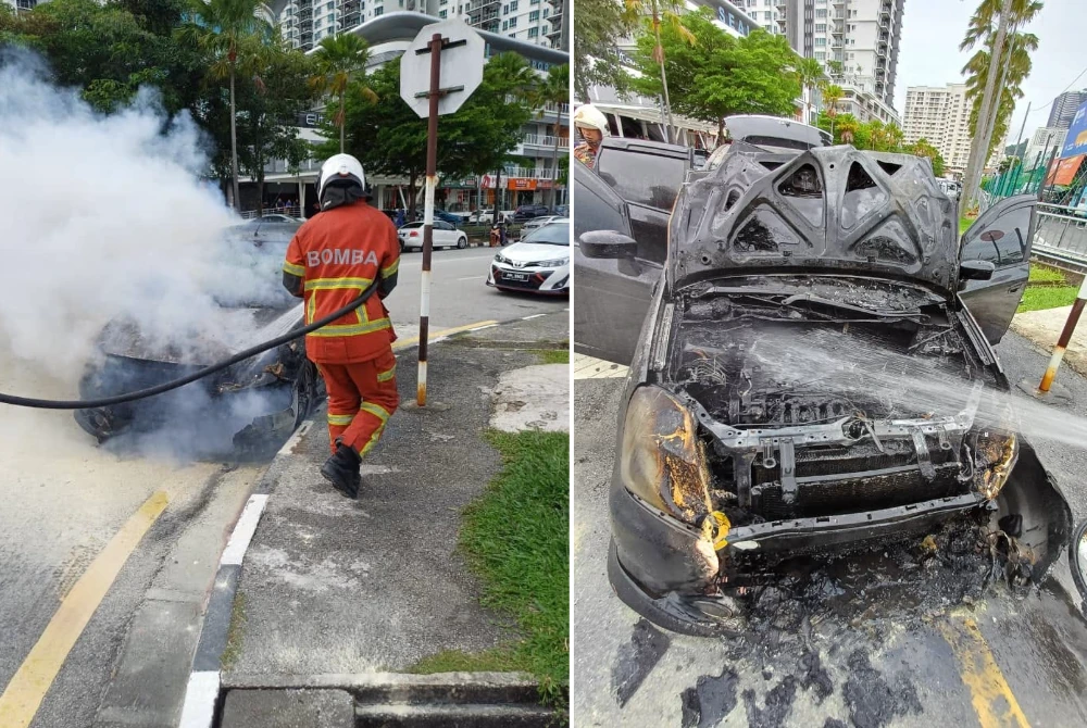 Anggota bomba memadam kebakaran sebuah kenderaan dalam kejadian di Lintang Mayang Pasir 5, pada petang Isnin.