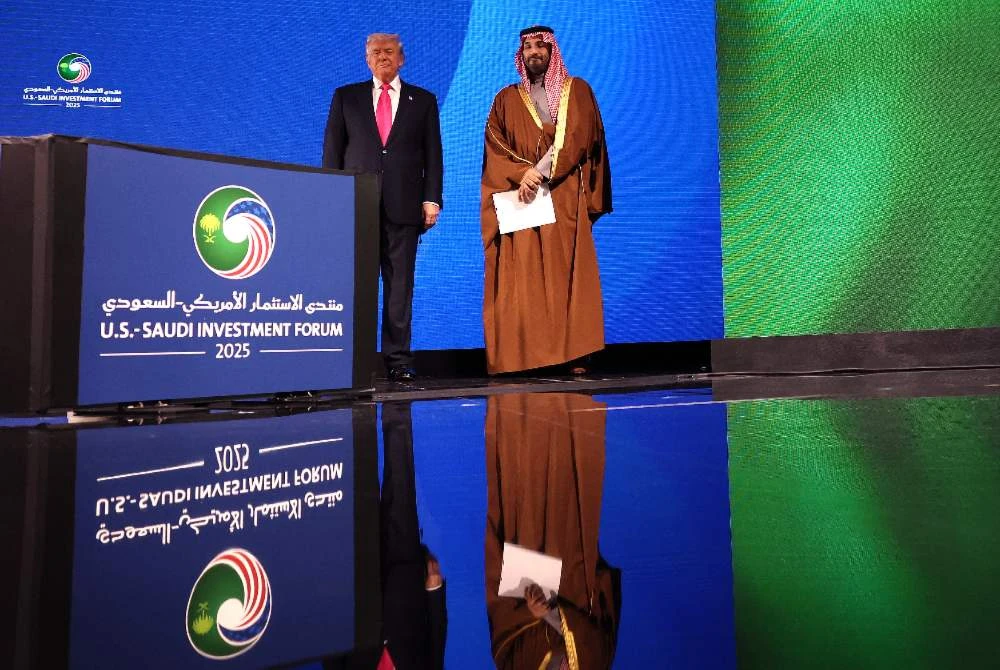Trump (kiri) dan MBS tiba di Forum Pelaburan AS-Arab Saudi di Kennedy Center, Washington DC. Foto: AFP