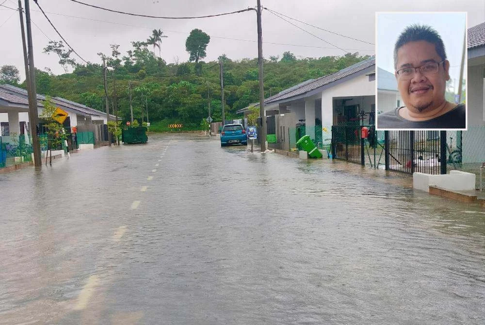 Hujan lebat berterusan sejak tengah malam menyebabkan longkang gagal menampung air sehingga melimpah masuk ke rumah penduduk sekitar jam 9 pagi. Gambar kecil: Mohd Qusairi.