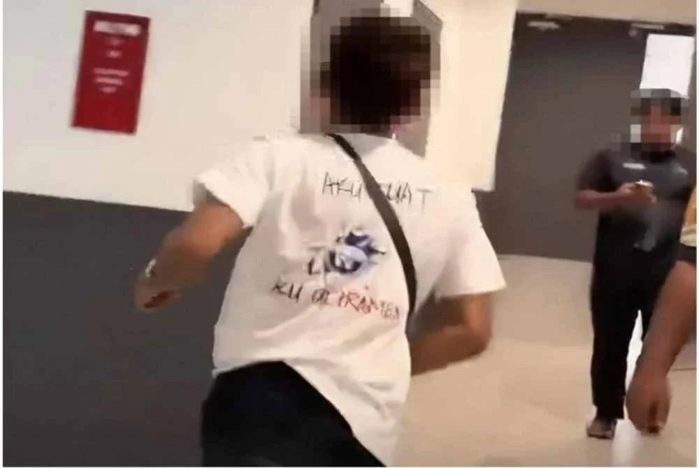 Gambar tular menunjukkan suspek melarikan diri sebaik menyedari perbuatannya terbongkar.