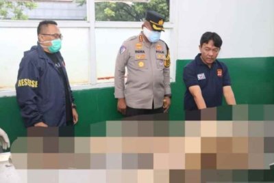 Mayat mangsa ditemui dalam bungkusan plastik. Foto Agensi