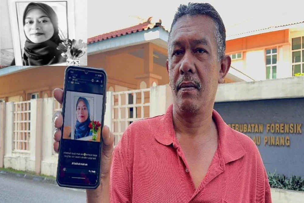 Shahrin menunjukkan gambar arwah isterinya, Allahyarham Norehan (gambar kecil).