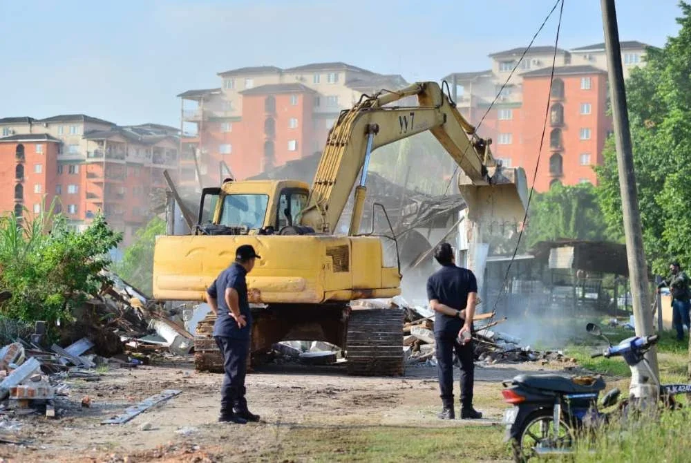 Sebanyak 19 rumah di Kampung Jawa dirobohkan bagi memberi laluan kepada projek WCE. FOTO SINAR HARIAN/ASRIL ASWANDI SHUKOR.