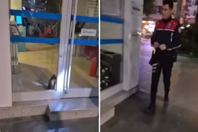 Polis berjaya membawa kucing itu keluar.- Agensi