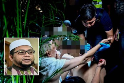 kesukaran mendakwa 171 lelaki warga tempatan yang ditahan dalam serbuan pusat spa dan kesihatan di Chow Kit berikutan kekangan undang- undang sedia ada. Gambar kecil: Datuk Dr Ahmad Marzuk Shaary