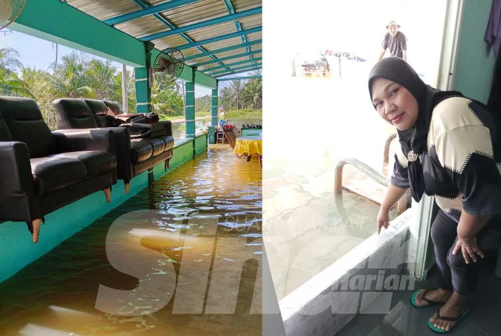 Norsidah menunjukkan benteng yang dibina di hadapan pintu rumahnya untuk menghalang air banjir dan penduduk terpaksa meletakkan sofa di tempat yang tinggi bagi mengelak daripada kerosakan.