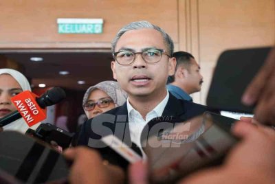 Fahmi mengadakan sidang media selepas selesai majlis Sambutan Hari Antirasuah Antarabangsa yang diadakan di Pusat Konvensyen Antarabangsa Putrajaya pada Jumaat. Foto SINAR HARIAN-ROSLI TALIB 