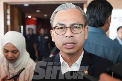 Fahmi ketika sidang media selepas selesai majlis Sambutan Hari Antirasuah Antarabangsa yang diadakan di Pusat Konvensyen Antarabangsa Putrajaya pada Jumaat. Foto: SINAR HARIAN-ROSLI TALIB 