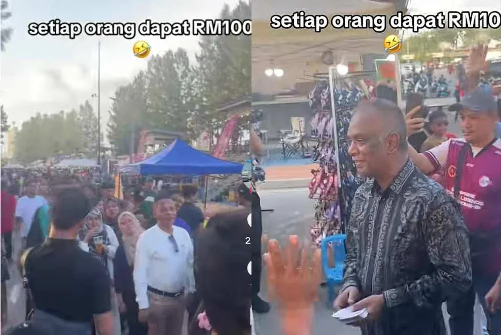 Orang ramai beratur bagi mendapatkan wang RM100 daripada Salim ketika berada di Pantai Klebang.