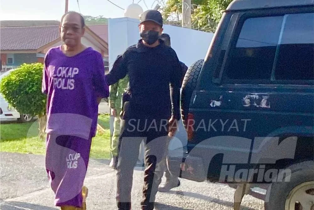 Suspek dihadapkan ke Mahkamah Majistret di sini pada Rabu atas pertuduhan membunuh isterinya menggunakan pisau pada 1 Disember lalu. - Foto: SINAR HARIAN/HAZELEN LIANA KAMARUDIN