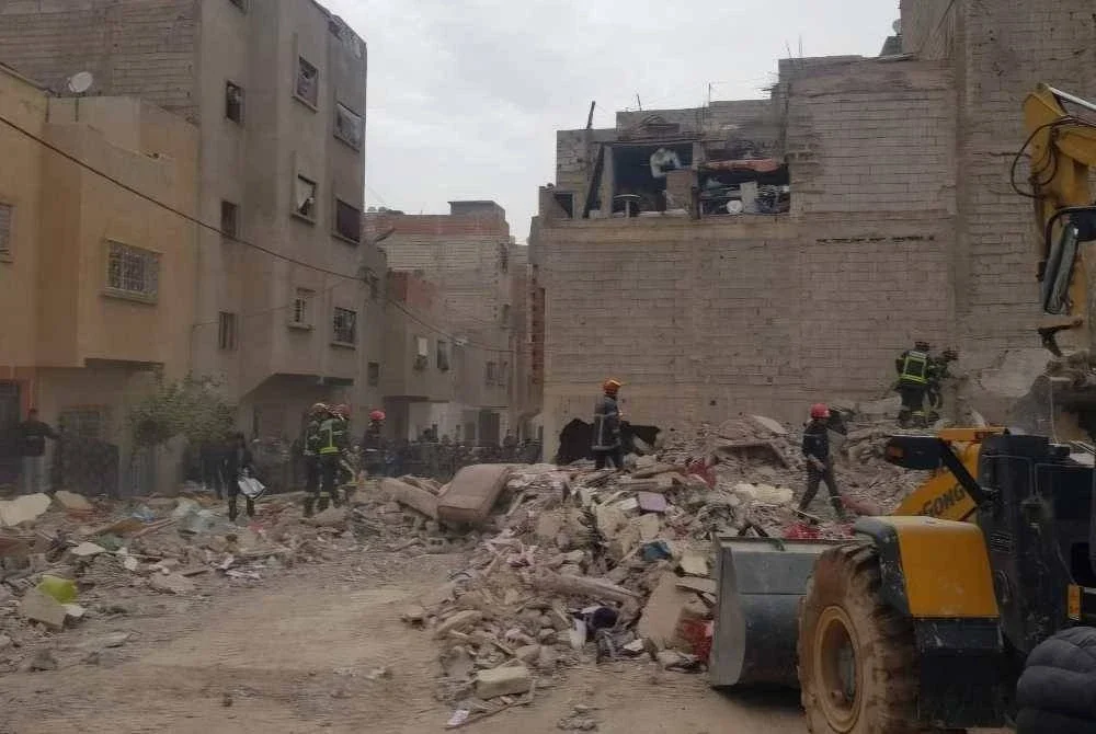 Runtuhan dua bangunan menyebabkan 19 penduduk terkorban. - Foto Saouri Aissa/Xinhua