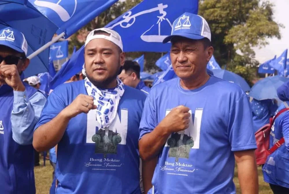 Mohd Naim (kiri) membuka peluang kepada mana-mana individu yang memenuhi kriteria tertentu untuk bertanding dan mempertahankan kerusi BN di DUN Lamag.