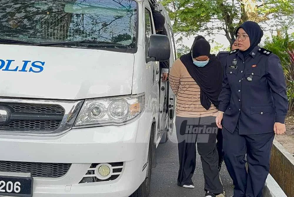 Nurul Natasha (kiri) dibawa ke Mahkamah Sesyen Butterworth pada Khamis. 