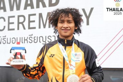 Zulfikri menghadiahkan pingat perak untuk Malaysia. Foto: MSN