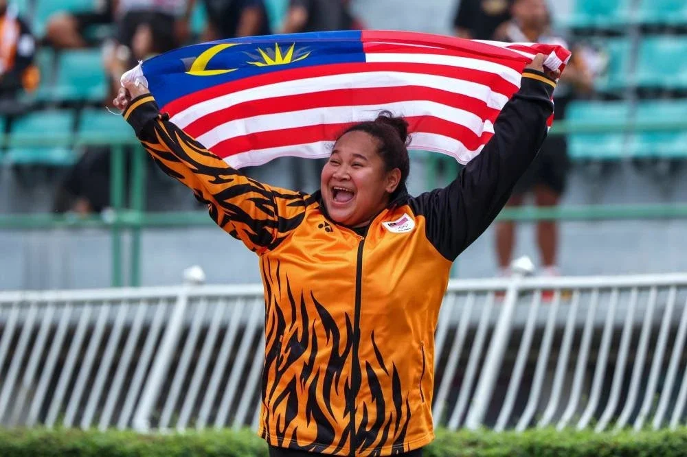 Grace berjaya meraih emas dan cipta rekod temasya dengan catatan 65.41m sempena Sukan SEA di Suphachalasai Stadium, National Stadium, Bangkok hari ini. Foto Bernama