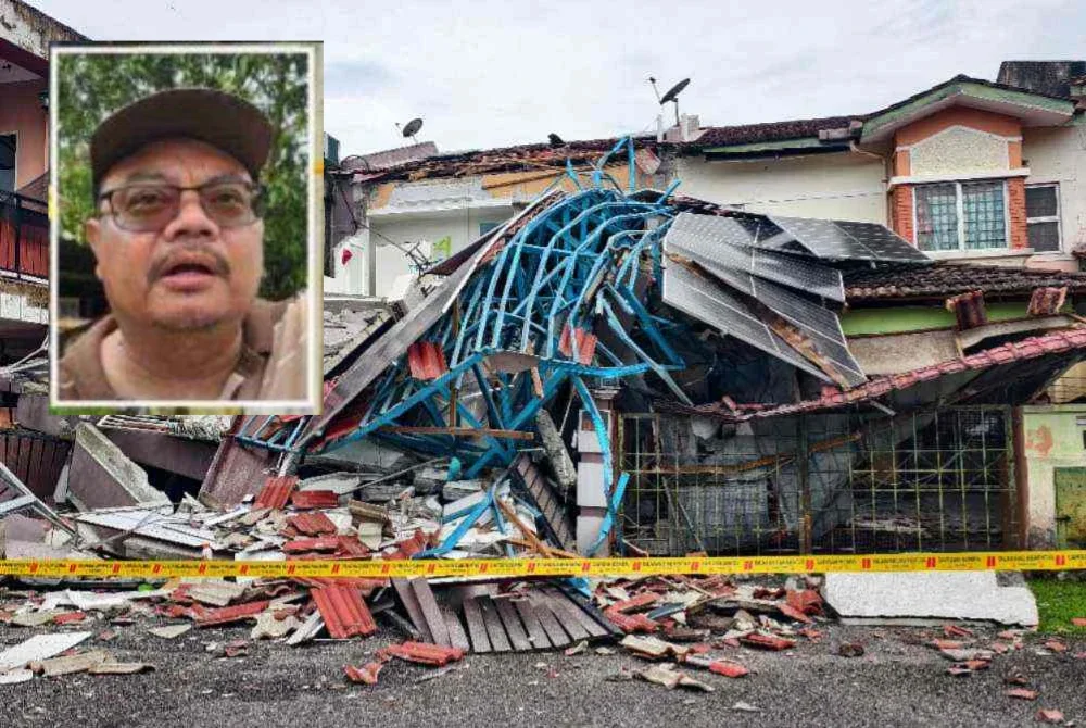 Keadaan struktur hadapan rumah Kamal Ariffin yang runtuh dalam kejadian awal pagi Khamis