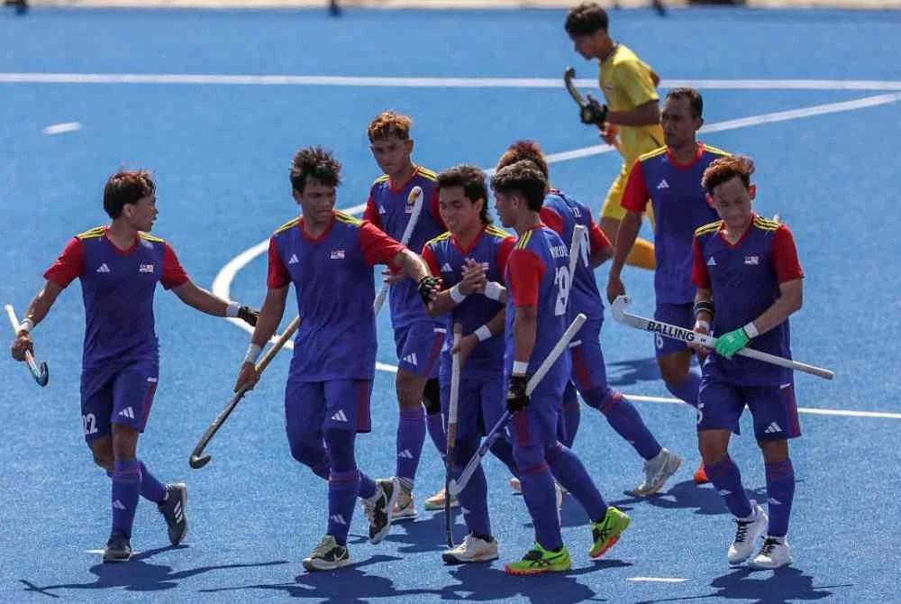Pasukan Malaysia meraikan jaringan gol ketika menentang Thailand dalam perlawanan akhir Hoki Padang Lelaki pada Sukan SEA ke-33 di Universiti Sukan Kebangsaan, Chonburi pada Jumaat. Foto Bernama