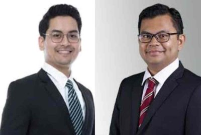 Mohammed Taufiq (kiri) dan Akmal Nasrullah diangkat menjadi menteri penuh ketika masing-masing berusia bawah 40 tahun.