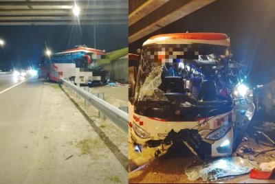 Keadaan bas ekspres tersebut selepas terbabas lalu melanggar tembok batu pembahagi jalan.