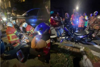 Anggota bomba membantu mangsa kemalangan,