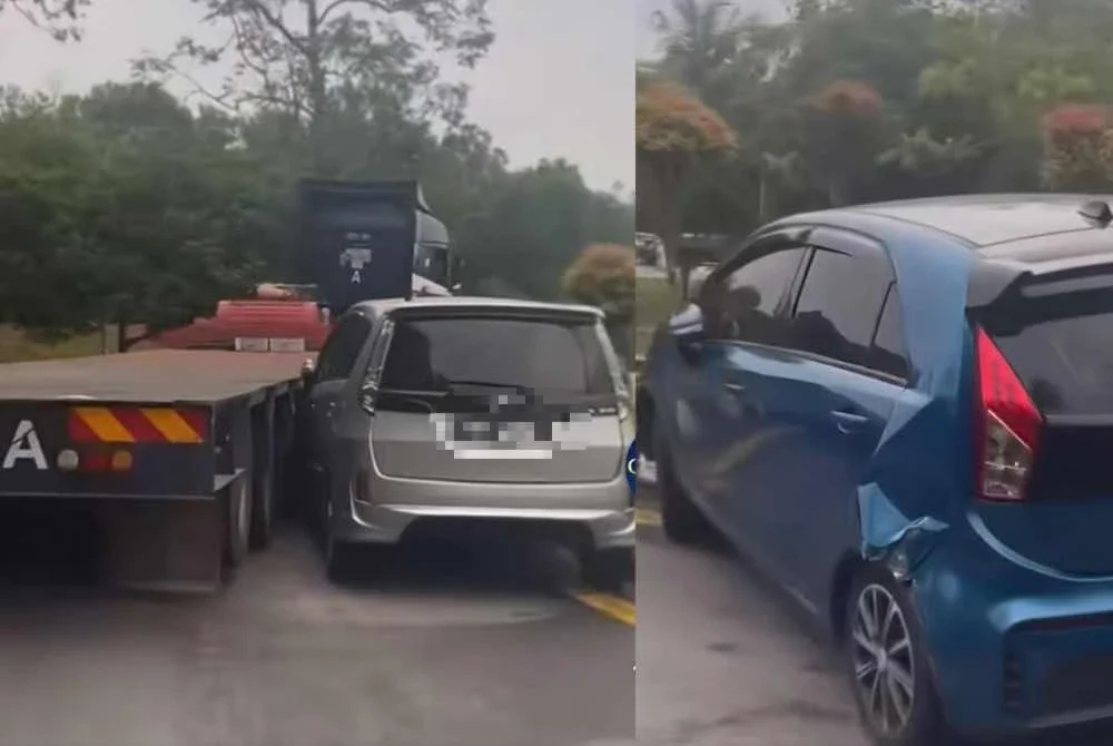 Antara kereta yang dihimpit treler bagi membolehkan kenderaan berat itu melepasi selekoh di R&R Ayer Keroh.