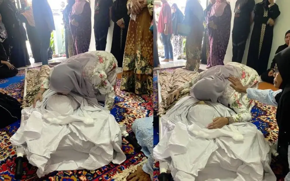 Hamizah mencium dan memeluk ibunya buat kali terakhir di kediamannya di Gemencheh,Negeri Sembilan.