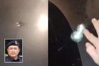 Kenderaan pacuan empat roda mengalami kerosakan pada cermin selepas dikatakan terkena batu yang dicampakkan dari atas jambatan semasa melalui Lebuhraya WCE baru-baru ini. Gambar kecil: Mohd Akmalrizal