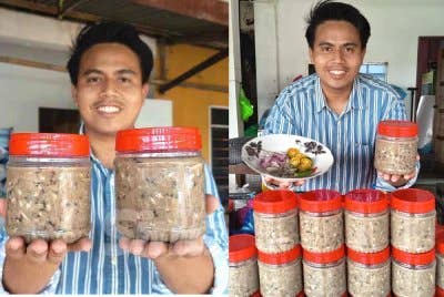 Aliff Aiman menunjukkan budu berekor yang siap dibotolkan dan sedia untuk dihantar kepada pelanggan.