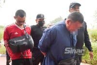 Muhammad Barur (kiri) ketika dibawa ke Mahkamah Sesyen Klang pada 2024 lalu.