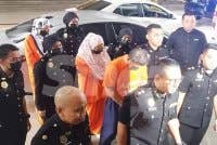 Seorang bekas Panglima Tentera Darat dan dua isterinya tiba di Kompleks Mahkamah Majistret Putrajaya bagi permohonan reman pada Khamis.