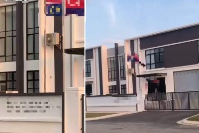Tangkap layar video tular menunjukkan Jalur Gemilang dipasang terbalik di sebuah premis Taman Eko Perniagaan 2, Senai Airport City, Kulai.