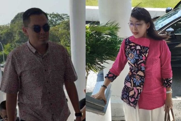 Dr Akmal dan Teresa ketika tiba di Kompleks Mahkamah Ayer Keroh ditemani peguam masing-masing pada Isnin.