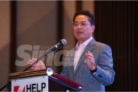 Azam semasa berucap di Majlis MoU antara SPRM dan HELP University di Bukit Kiara, Kuala Lumpur pada Selasa. Foto: MOHD HALIM ABDUL WAHID