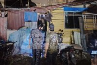 JIM melakukan pemeriksaan ke atas sebuah penempatan PATI di Jalan Klang Lama, Kuala Lumpur pada Rabu.