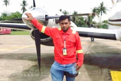 Allahyarham Mohamed Saiful di tempat kerjanya.