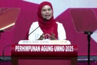 Noraini menyampaikan ucapan dasar sempena Perhimpunan Agung UMNO 2025 di WTC pada Khamis.
