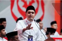 Dr Muhamad Akmal berucap pada Perhimpunan Agung Pergerakan Pemuda UMNO 2025 di Dewan Merdeka, Pusat Dagangan Dunia Kuala Lumpur (WTCKL), pada Khamis. Foto Bernama