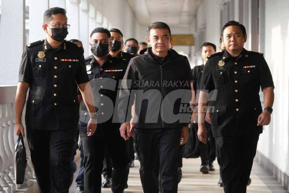 Hafizuddiean tiba di Kompleks Mahkamah Kuala Lumpur sekitar jam 8.10 pagi pada Khamis. FOTO: Rosli Talib