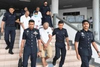 Kesemua tertuduh dihadapkan ke Mahkamah Majistret Ayer Keroh pada Khamis.