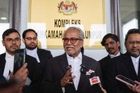 Muhammad Shafee bercakap pada sidang media di Kompleks Mahkamah Kuala Lumpur pada Jumaat. Foto Bernama