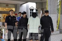 Wing Kit berbaju T warna putih, dihukum penjara dua tahun dan denda RM5,000 oleh Mahkamah Majistret Putrajaya pada Khamis. 