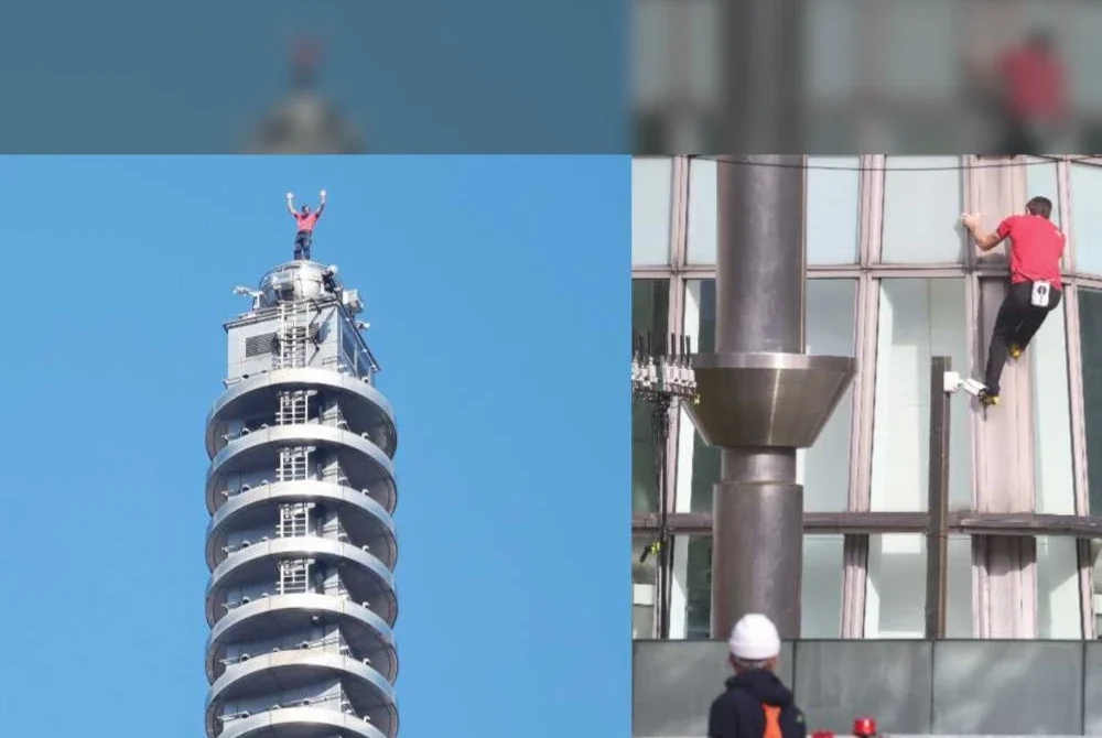 Pendaki tebing Amerika Syarikat, Alex Honnold, mengangkat tangannya dari puncak bangunan Taipei 101 selepas berjaya memanjat bebas mercu tanda itu tanpa tali atau peralatan keselamatan di Taipei pada 25 Januari 2026.-AFP