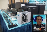 Antara peralatan yang digunakan dalam aktiviti penipuan dirampas polis. Gambar kecil: Rusdi