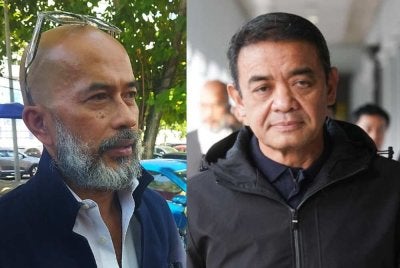 Aizul Rohan (kiri) memberitahu Muhammad Hafizuddeain membuat dua laporan polis terhadap Chegubard susulan dakwaan pendedahan maklumat peribadi dan tuduhan tidak berasas.