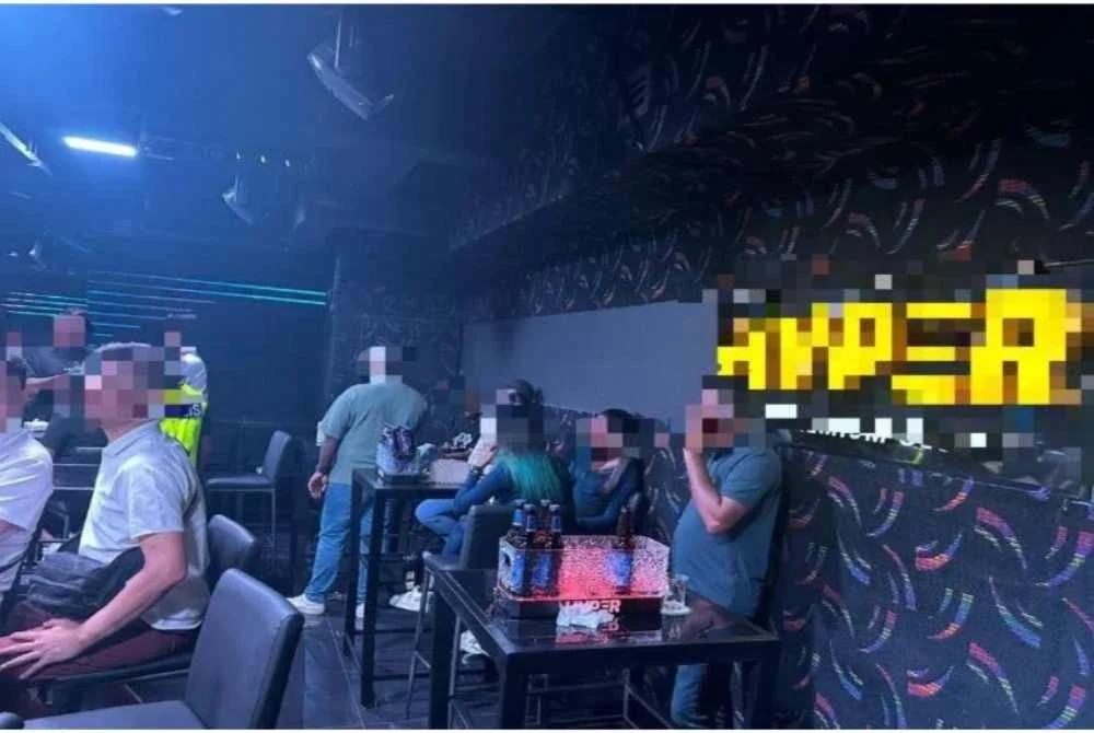 Antara yang ditahan polis pada serbuan berkenaan. 